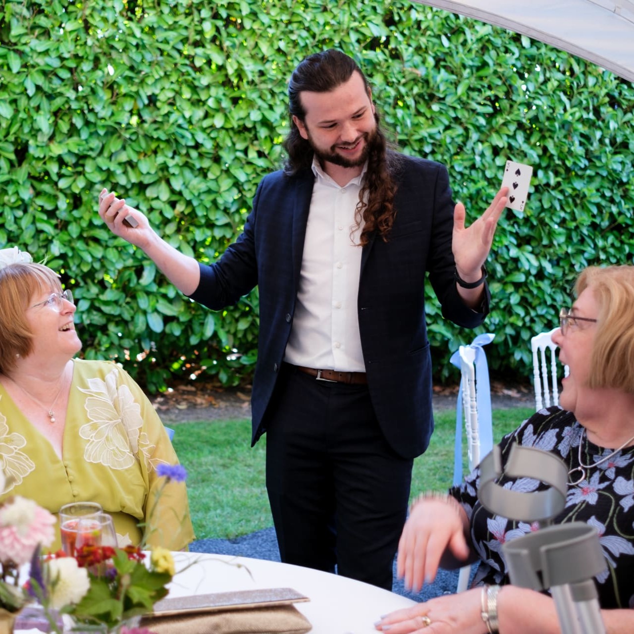 Callum McClure performing walkaround magic at a birthday party near Guildford