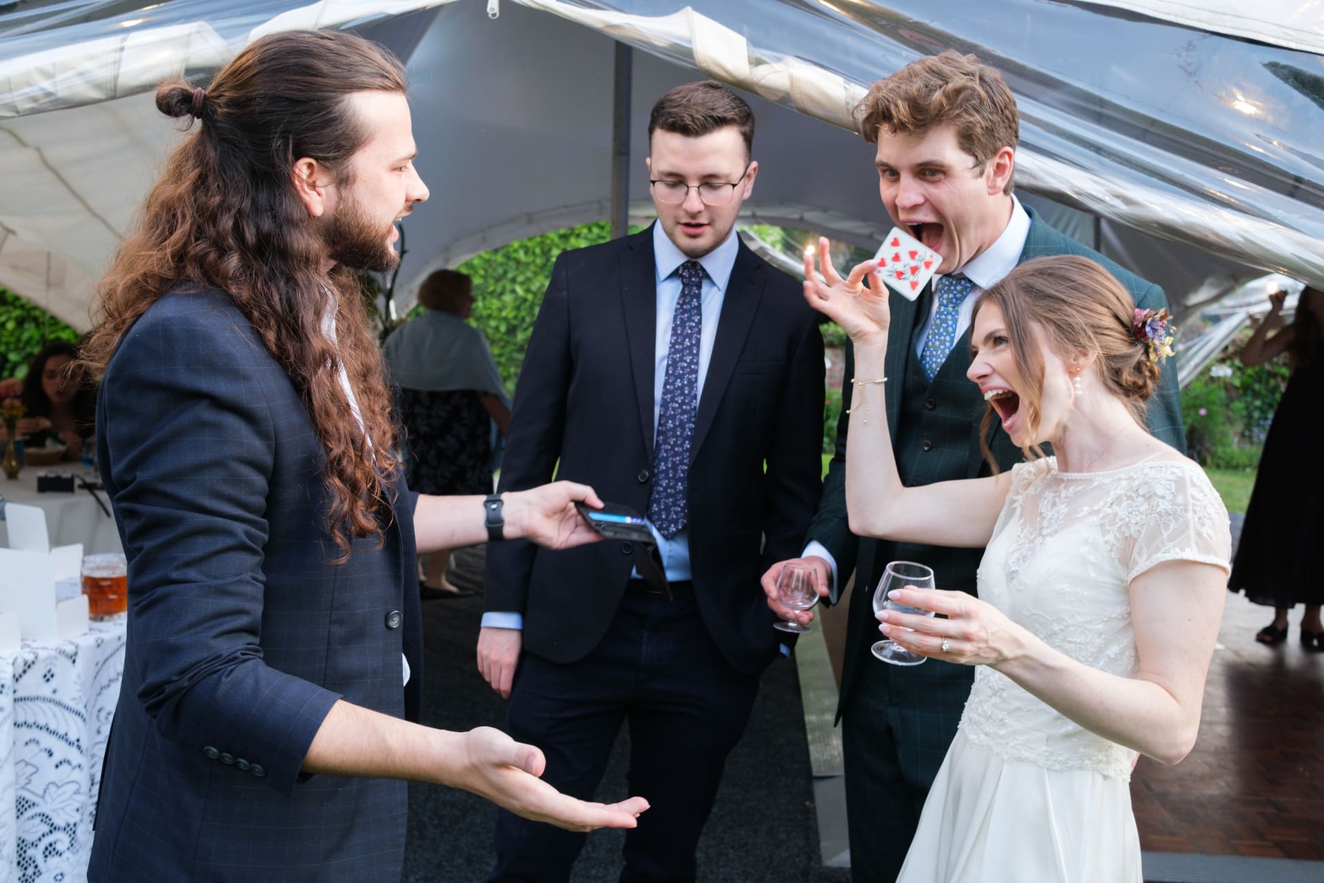 Callum McClure performing close-up magic at a Surrey wedding reception